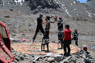 06 French Guide Olivier Riviere And Porters Nestor and Peluca Build A New Inka Expediciones Large Tent On a Rest Day At Aconcagua Plaza Argentina Base Camp 4200m.jpg